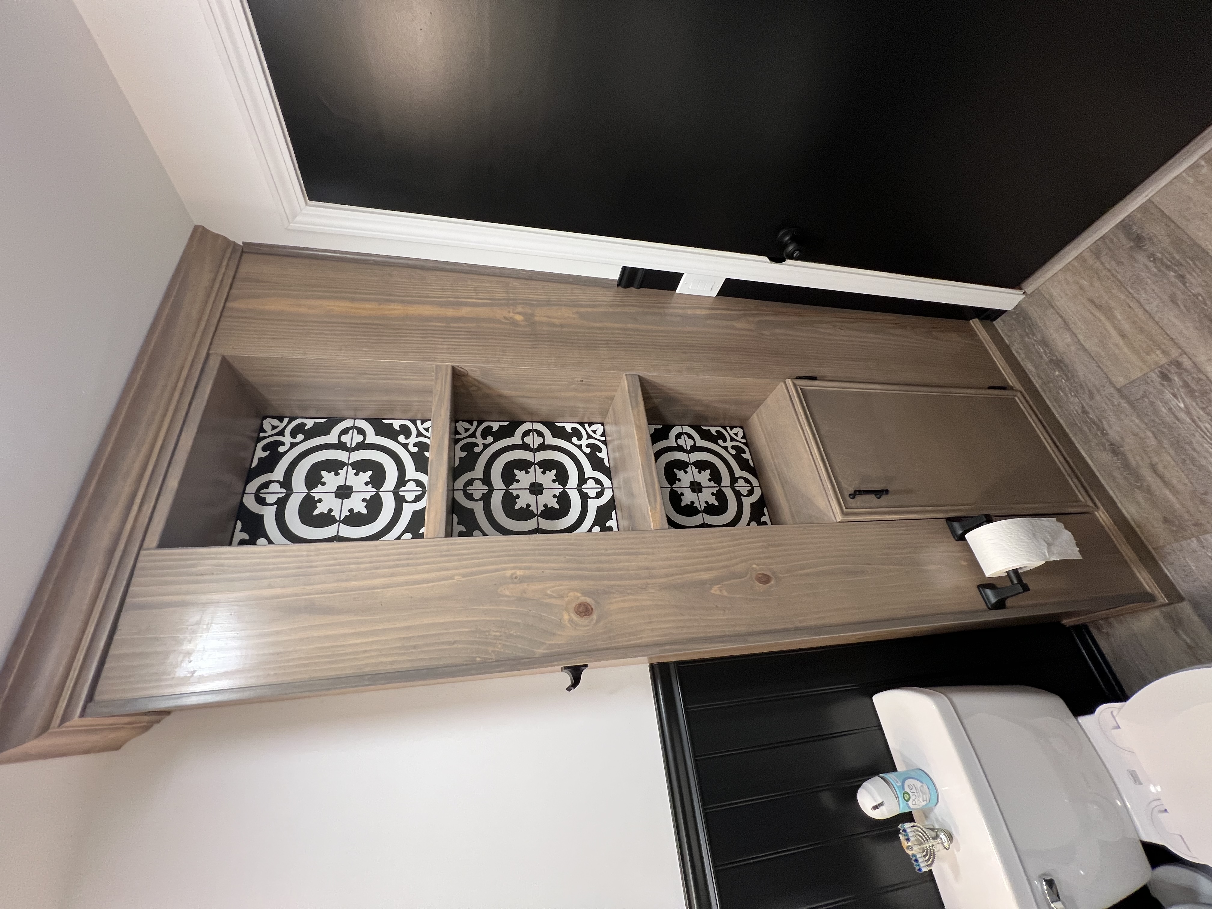 Custom built-in shelving with tile accent