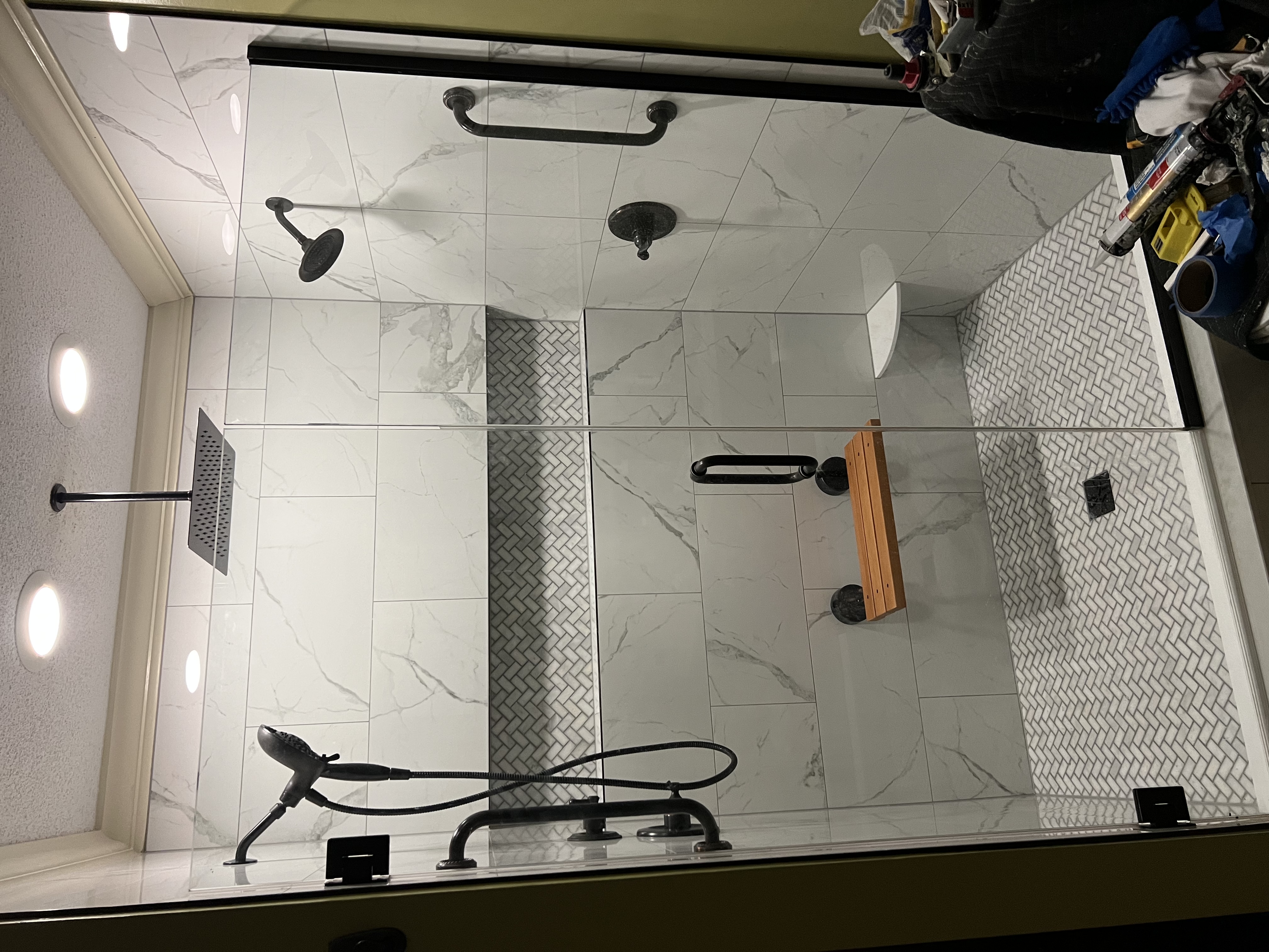 Custom marble shower with multiple heads
