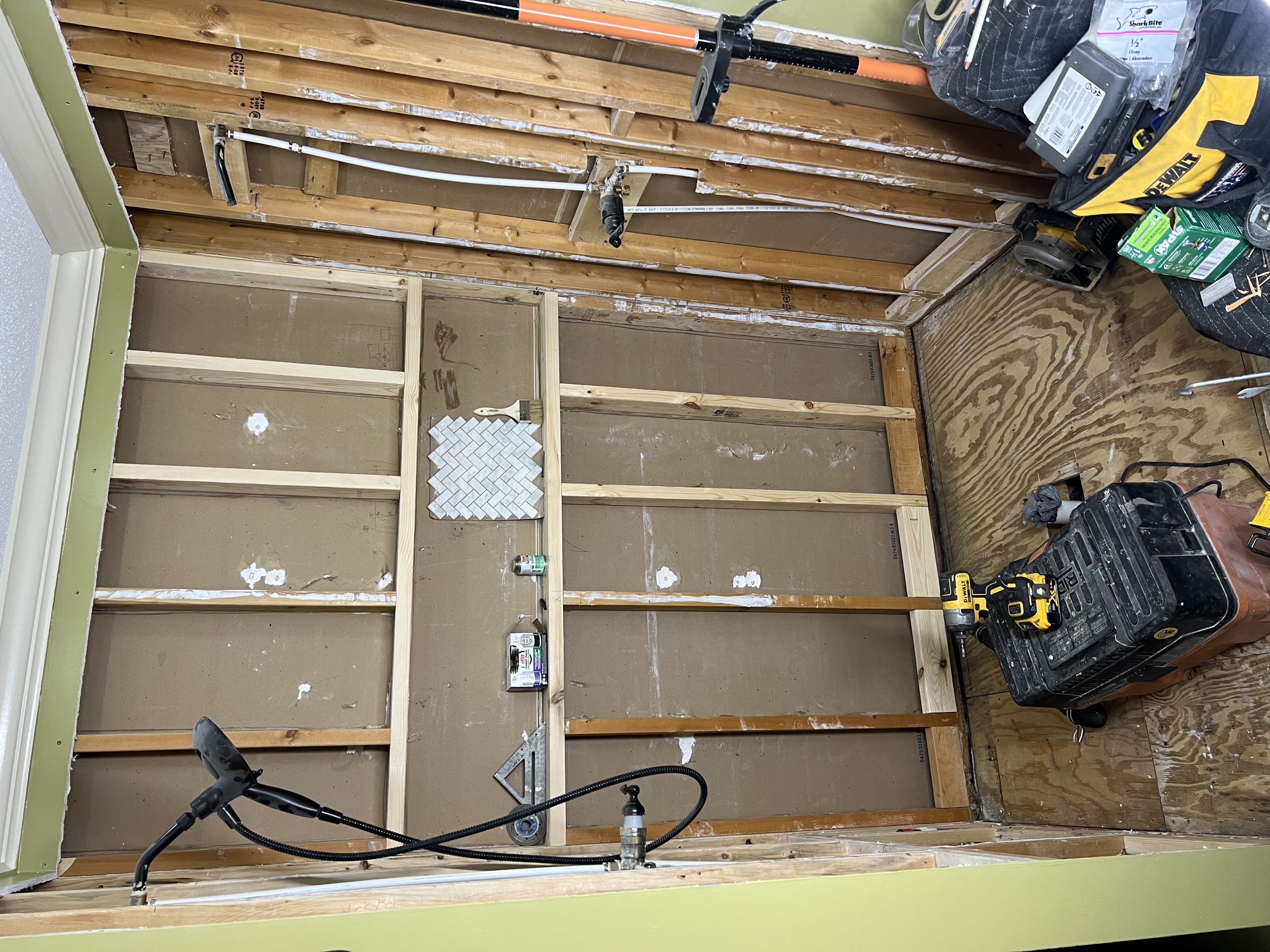 Custom travertine octagon tile shower with dual shower heads